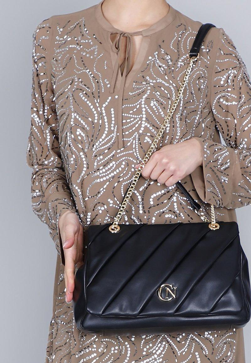 Borsa Cafènoir con patta plissettata WD0909